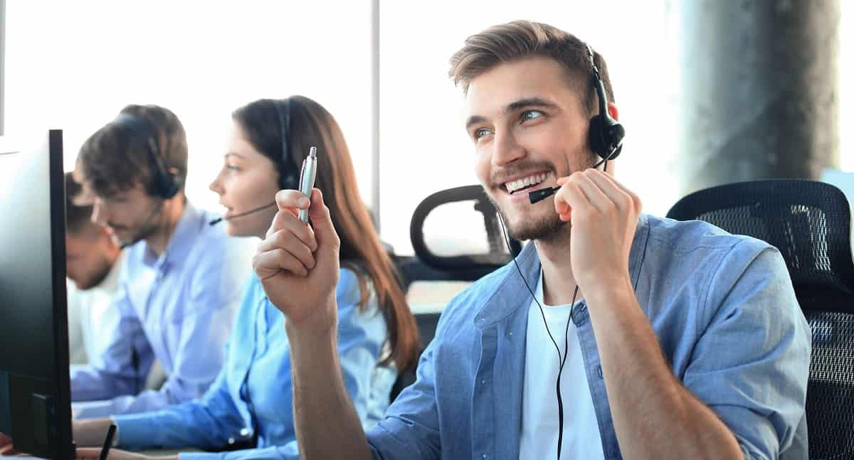 Smiling customer support operator at work