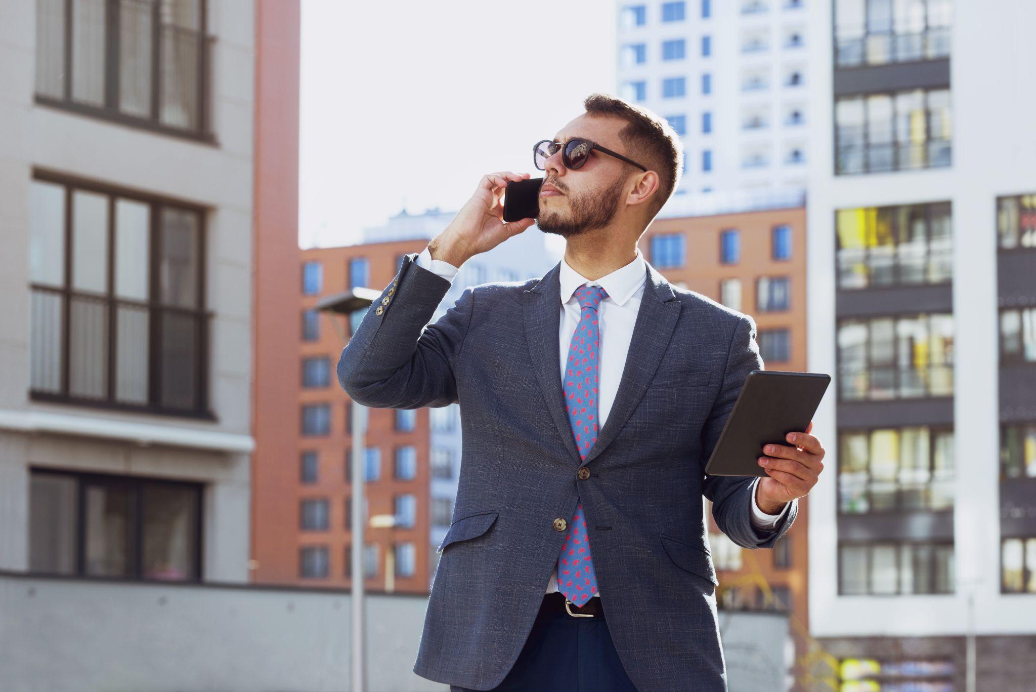 Real estate agent businessman city phone calling