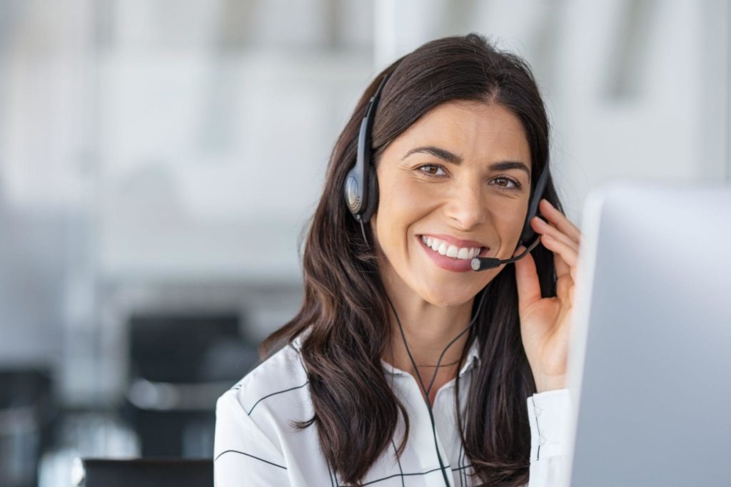Happy smiling woman working in call center